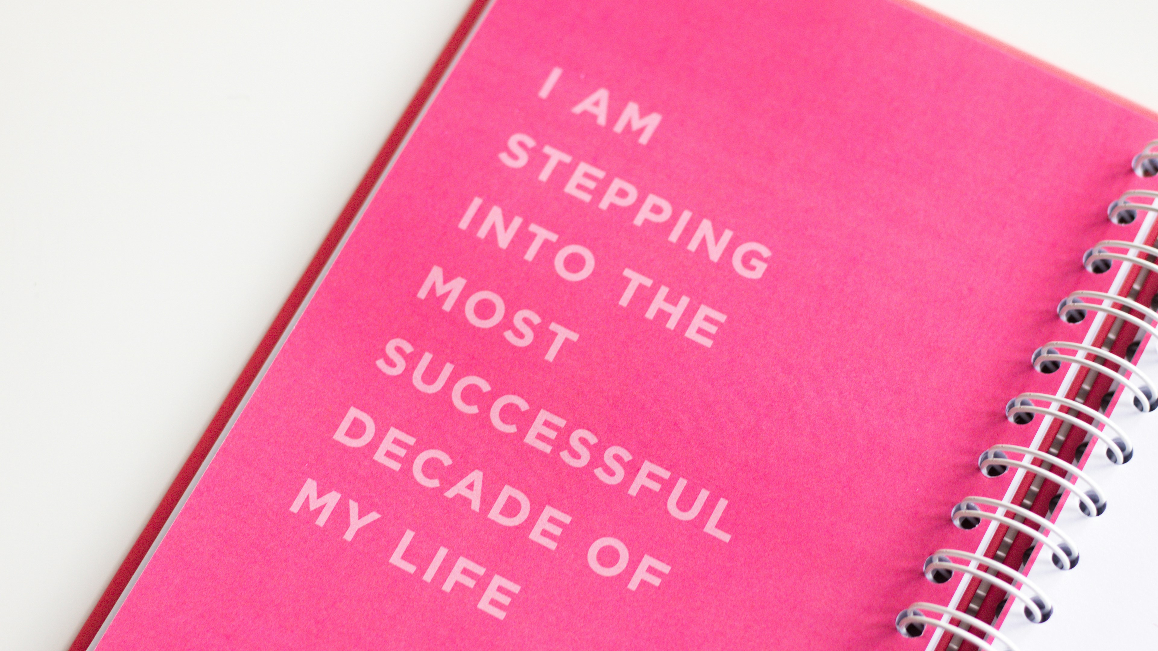 Pink journal with a success message